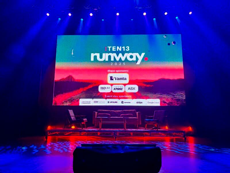 Ten13 Runway 2025 stage with UpSure event day sponsor logo